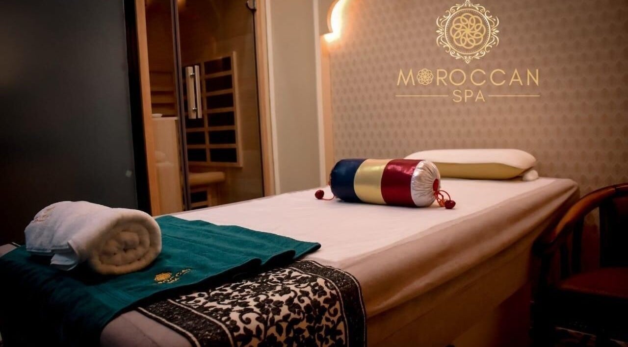 Relaxing spa treatment room at Moroccan Spa, Lucknow, Uttar Pradesh, IN with massage table and ambient lighting.