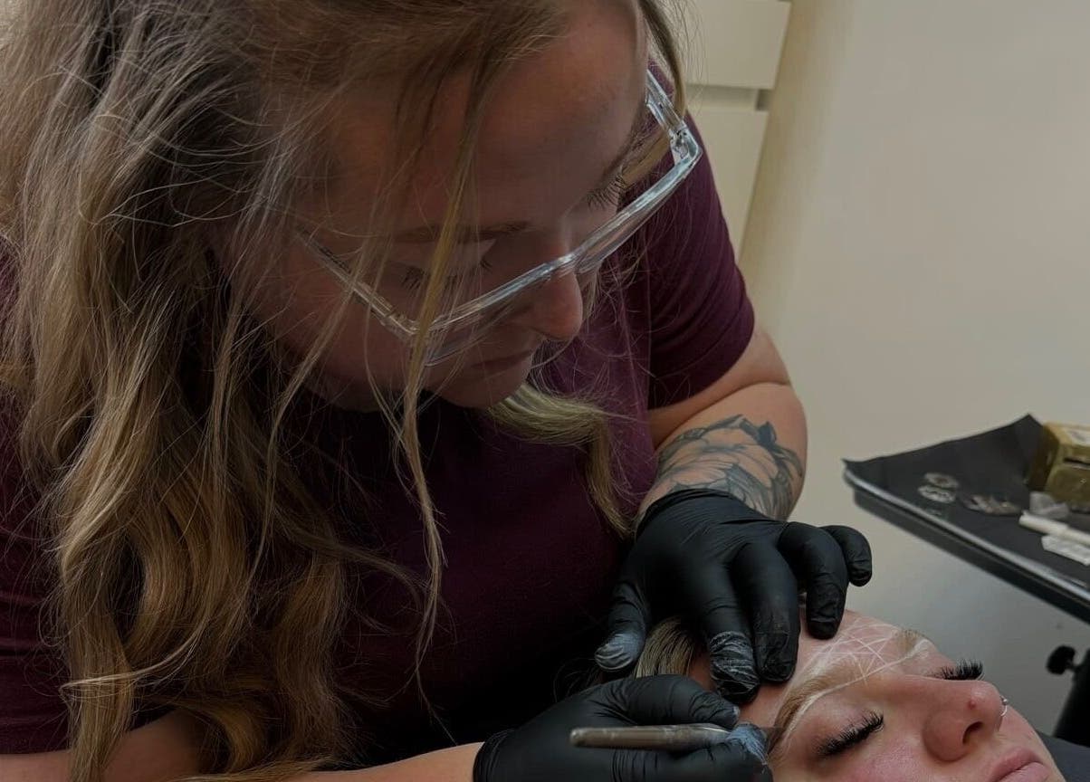 Expert microblading at Studio Twenty-Two Esthetics, Alberta, Alberta, CA enhancing client eyebrows.