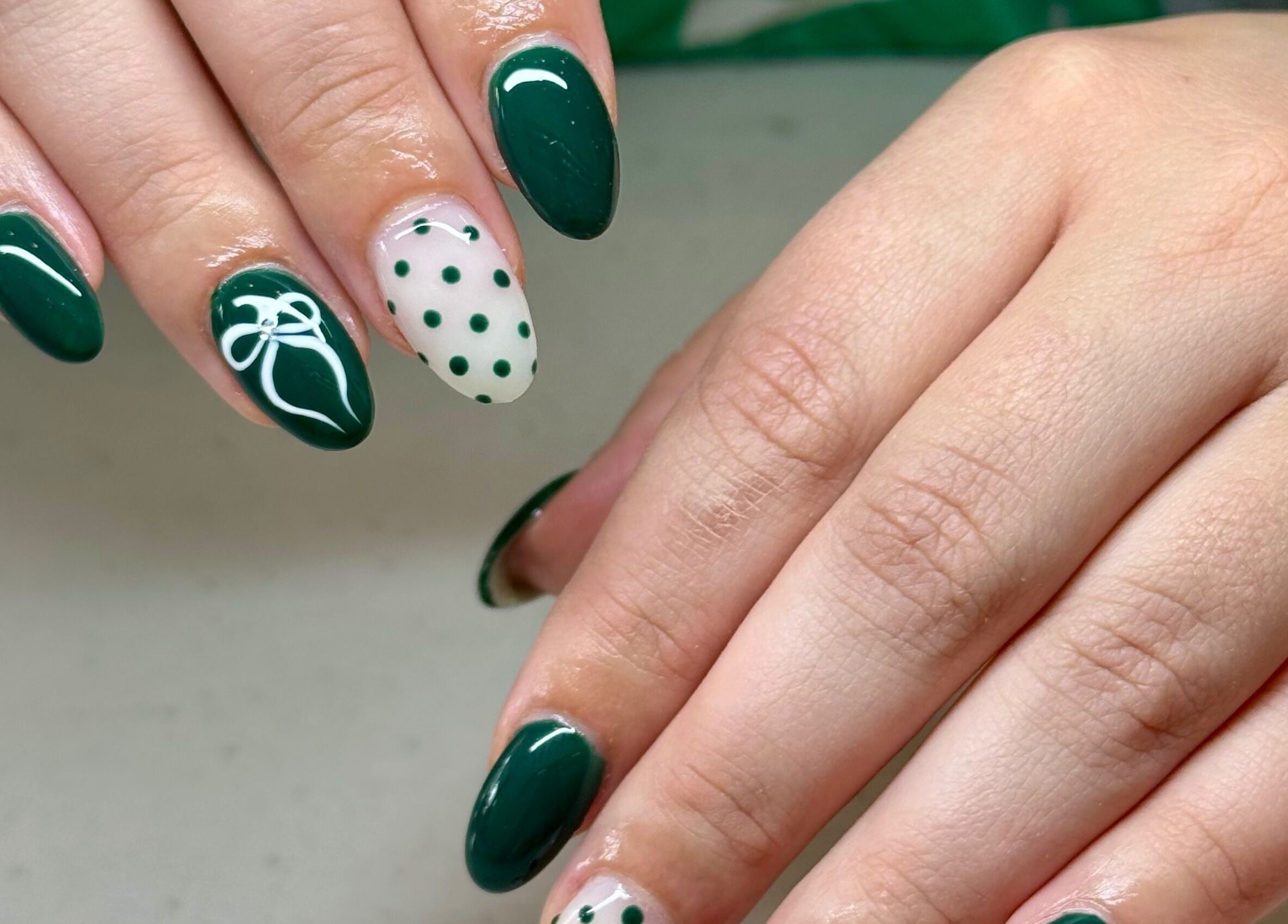 Stylish green and polka dot nail art at Glam Nail Studio, Melbourne, Victoria, AU.