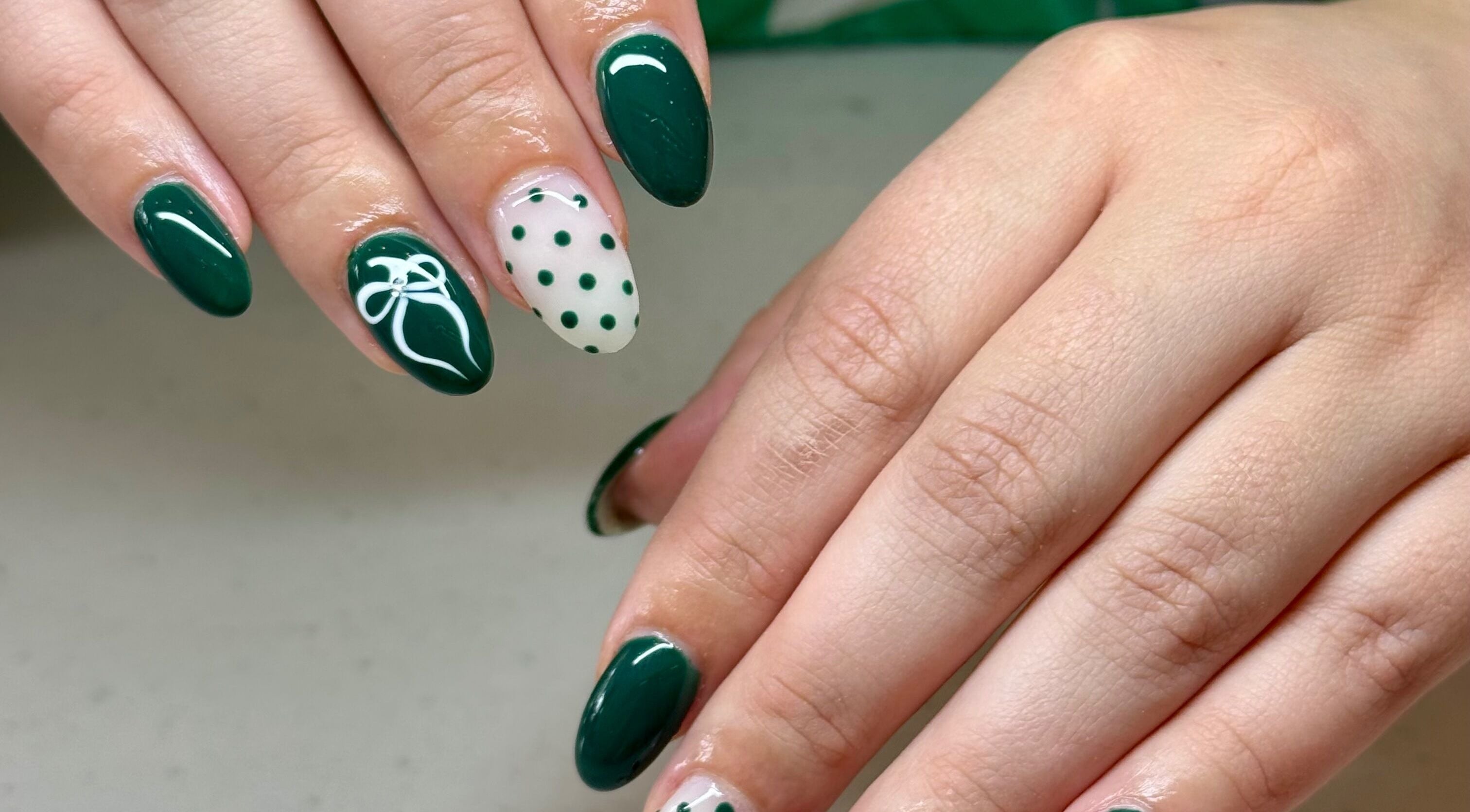 Stylish green and polka dot nail art at Glam Nail Studio, Melbourne, Victoria, AU.