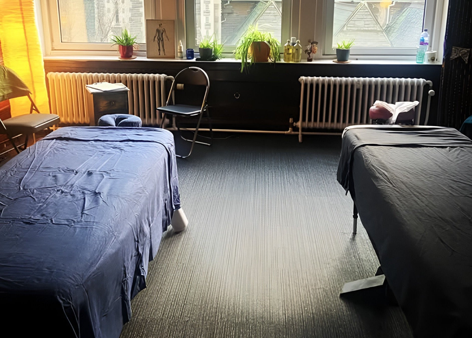 Relaxing therapy room at Dakota Therapies at Victorian Studio, Cardiff, GB with massage tables and cozy decor.