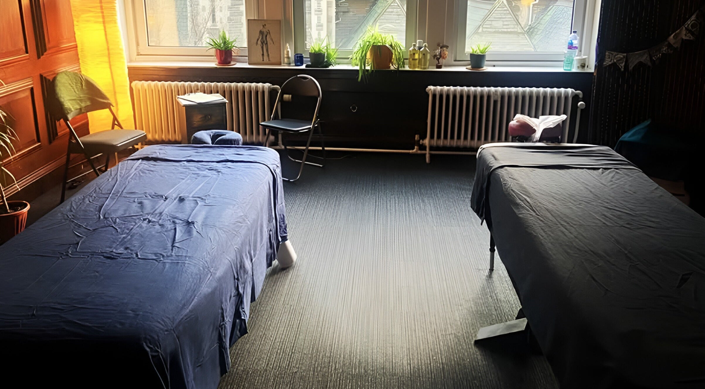 Relaxing therapy room at Dakota Therapies at Victorian Studio, Cardiff, GB with massage tables and cozy decor.