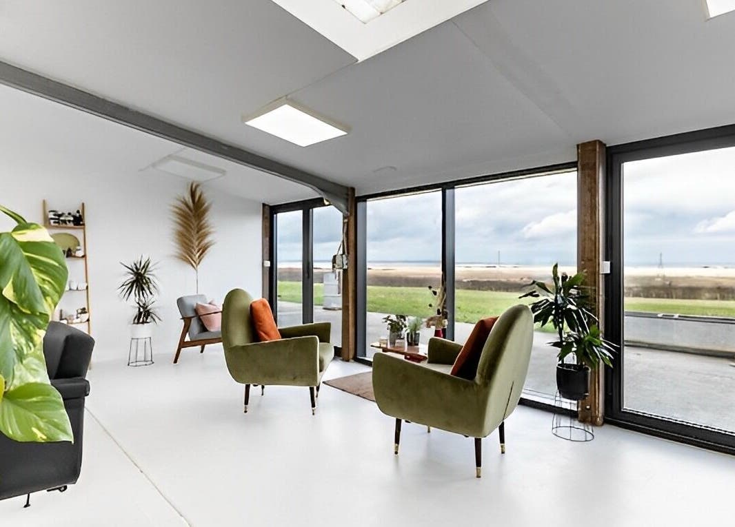 Bright, inviting lounge space at Joshua Rose Hair- Creative Space Kent, Faversham, England, GB with modern decor.