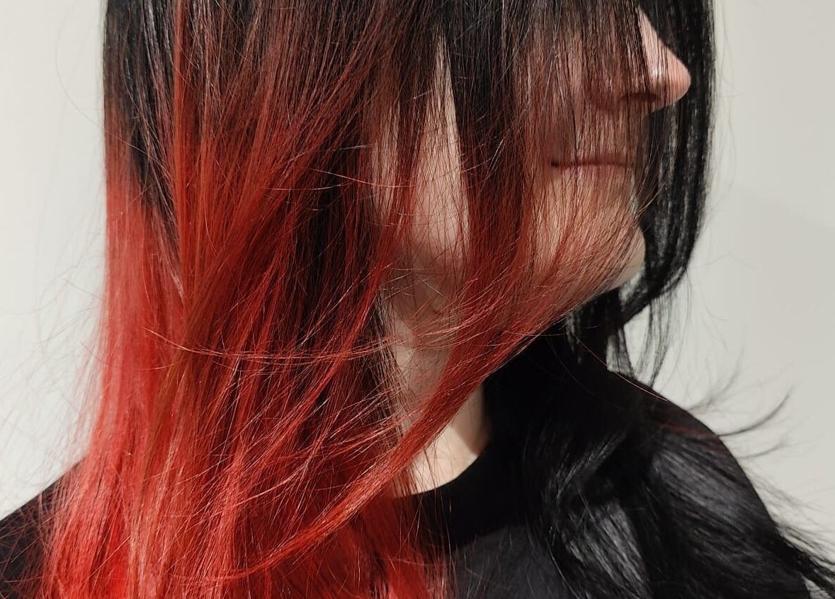 Vibrant red and black hair styled at Joshua Rose Hair - Creative Space Kent, Faversham, England, GB.