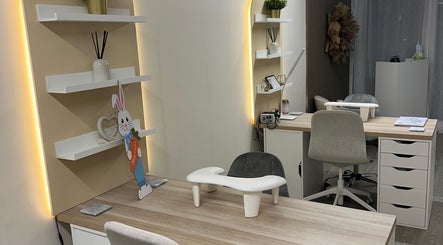 Modern manicure station at Luxe Enhancements in Rochester, England, GB with sleek design and subtle lighting.