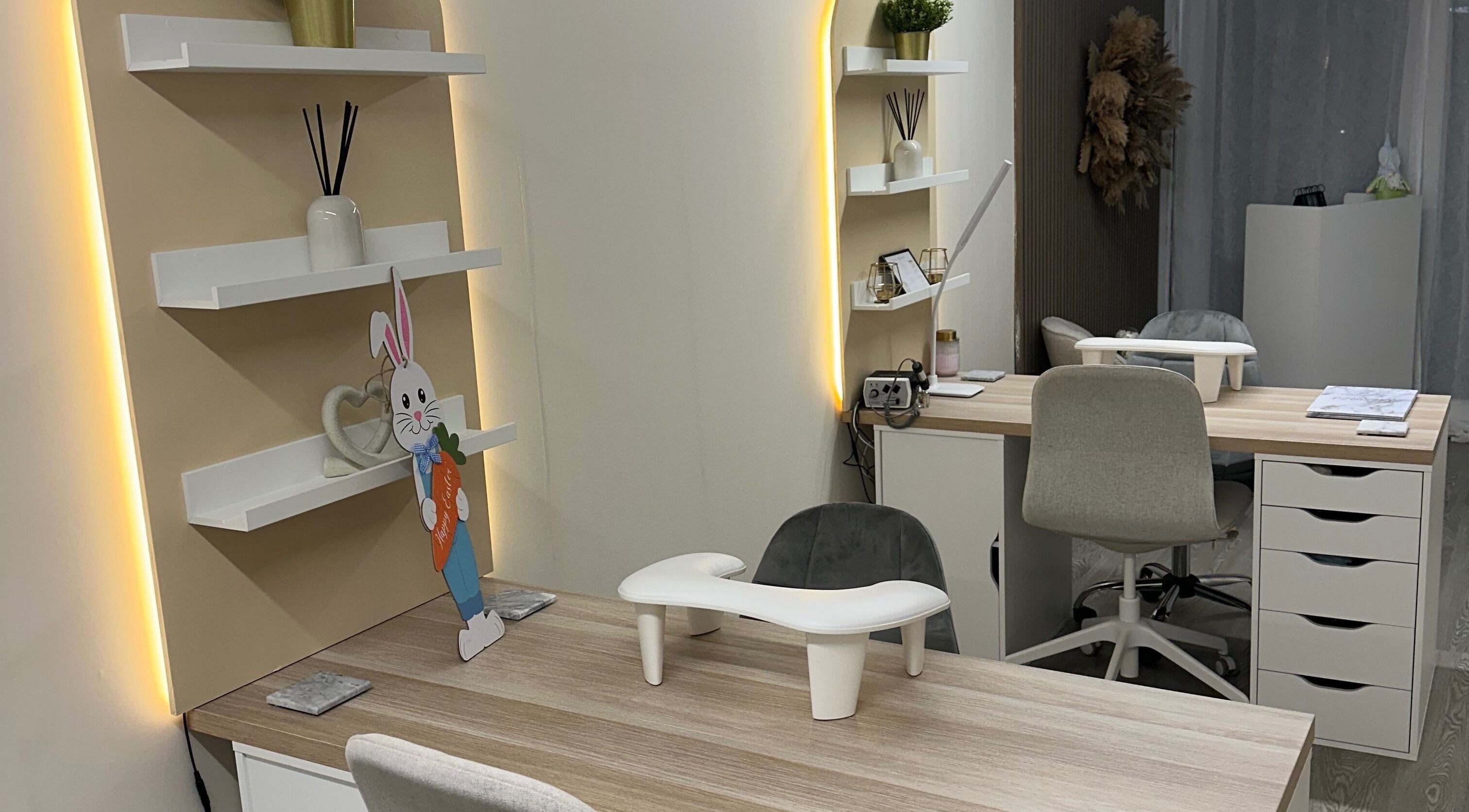 Modern manicure station at Luxe Enhancements in Rochester, England, GB with sleek design and subtle lighting.