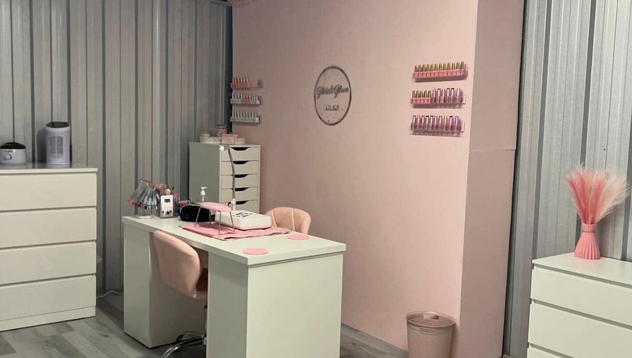 Elegant Glitz&GlamNailBar studio in Winsford, England with modern pink and white decor.
