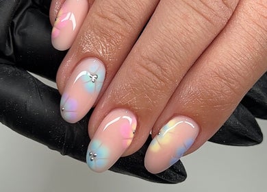 Stunning pastel gel nails with floral design at Glitz&GlamNailBar, Winsford, England, GB.