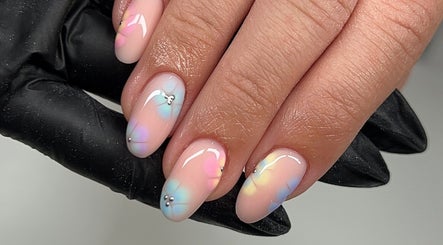 Stunning pastel gel nails with floral design at Glitz&GlamNailBar, Winsford, England, GB.