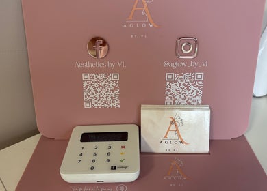 A chic branding display at Aglow by VL, Essington, England, GB with social media and payment options.