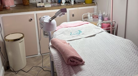 Relaxing spa bed and equipment at Aglow by VL in Essington, England, GB, ready for treatments.