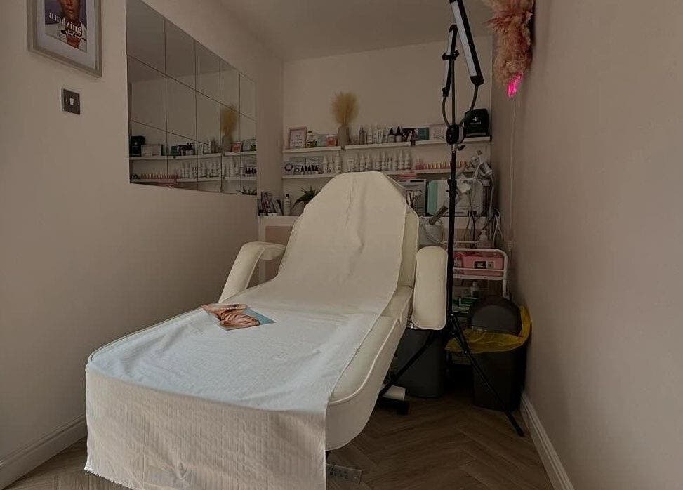 Relaxing treatment room at Aglow by VL in Essington, England, GB with comfortable chair and calming decor.