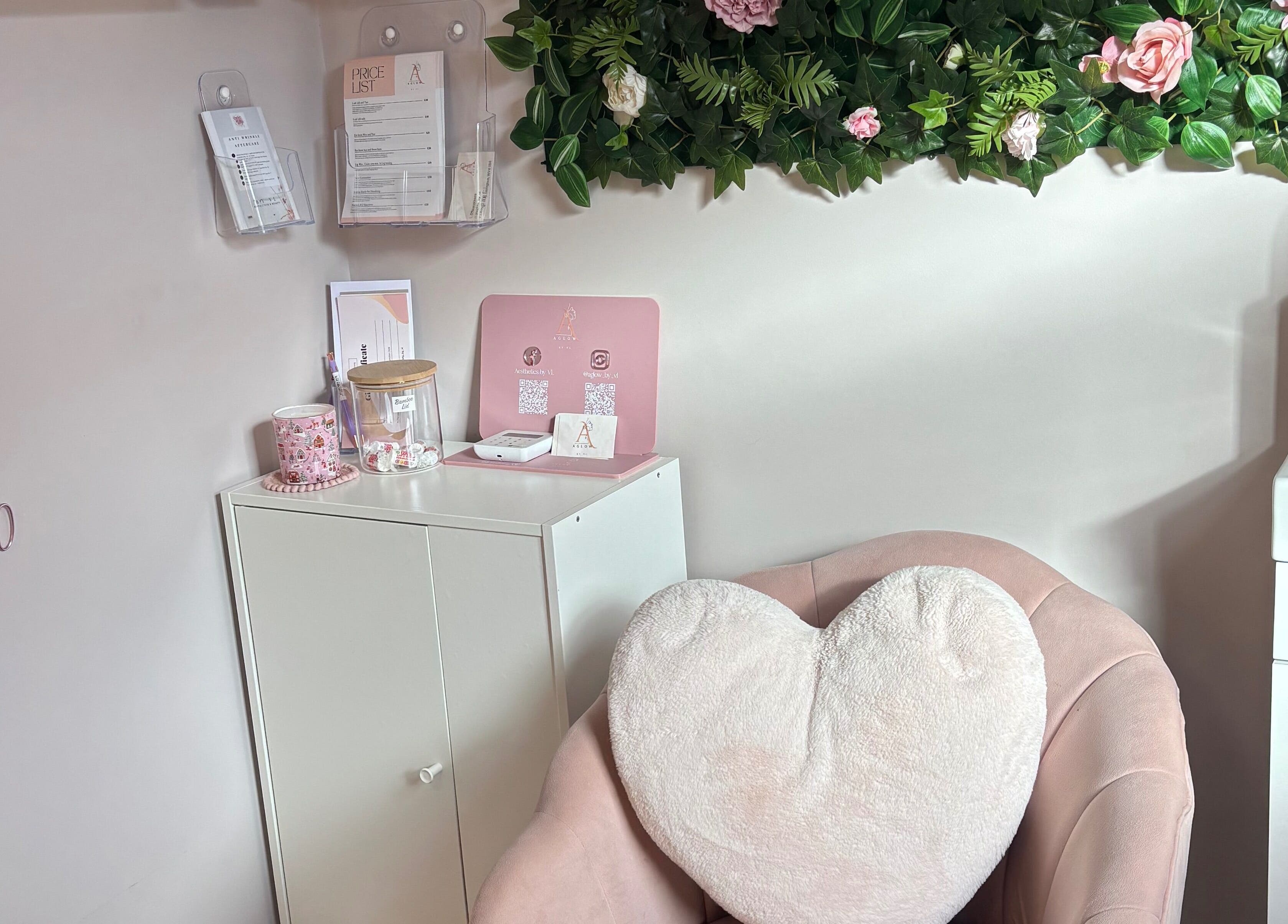 Aglow by VL's cozy corner with heart pillow and lush decor in Essington, England, GB.