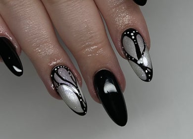 Stylish black and white nail art at Pressed Beans in Montréal, Québec, CA.