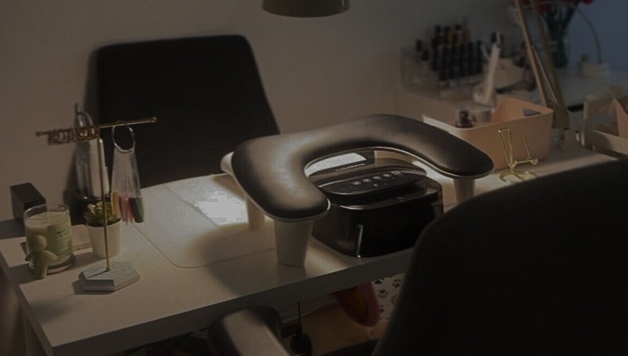 Cozy nail salon setup at Pressed Beans, Montréal, Québec, CA, featuring a manicure station and nail polish display.