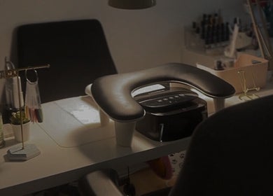 Cozy nail salon setup at Pressed Beans, Montréal, Québec, CA, featuring a manicure station and nail polish display.