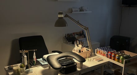 Cozy nail care station at Pressed Beans in Montréal, Québec, CA with tools and polishes neatly arranged.