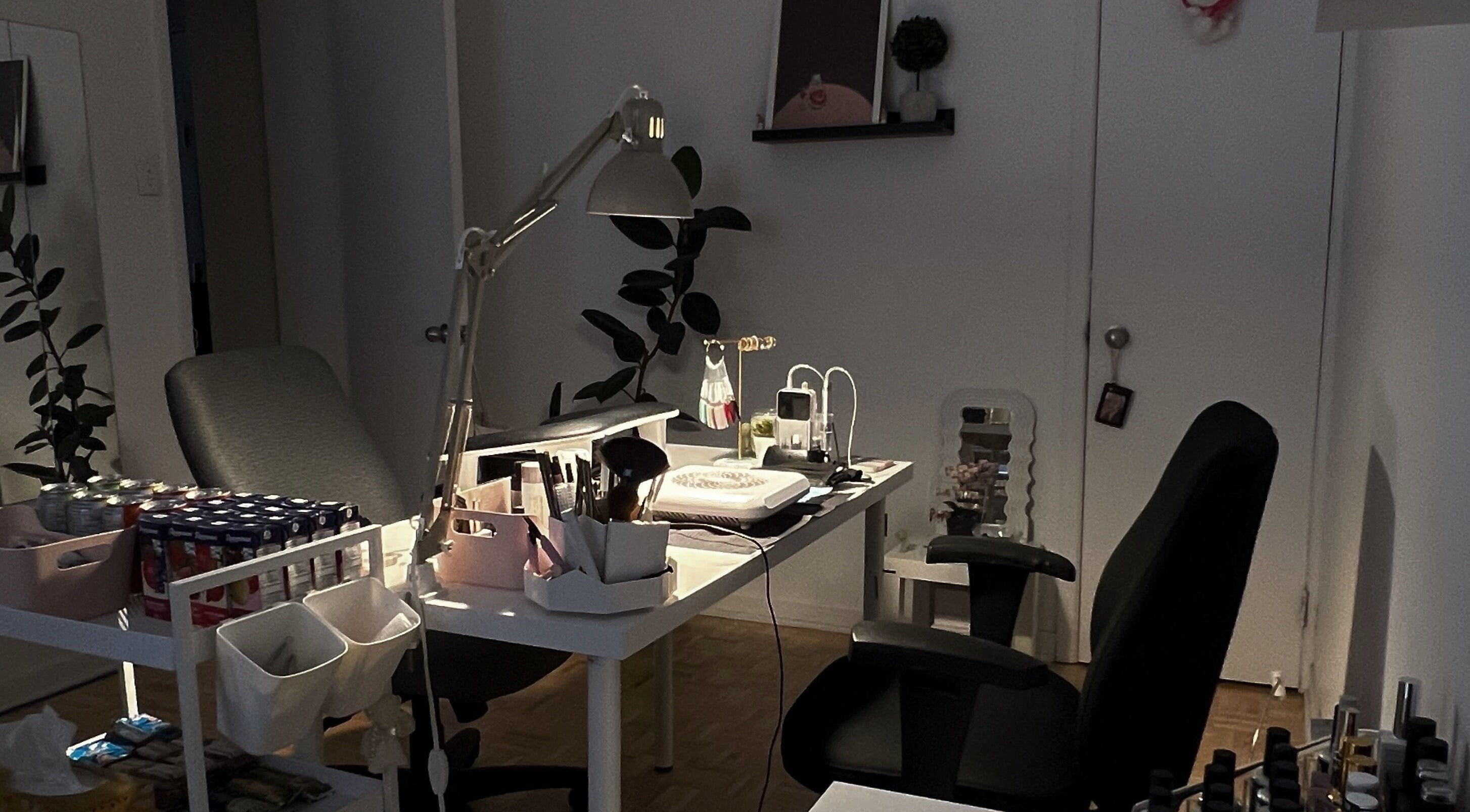 Cozy nail studio setup at Pressed Beans, Montréal, Québec, CA with tools and specialized lighting.