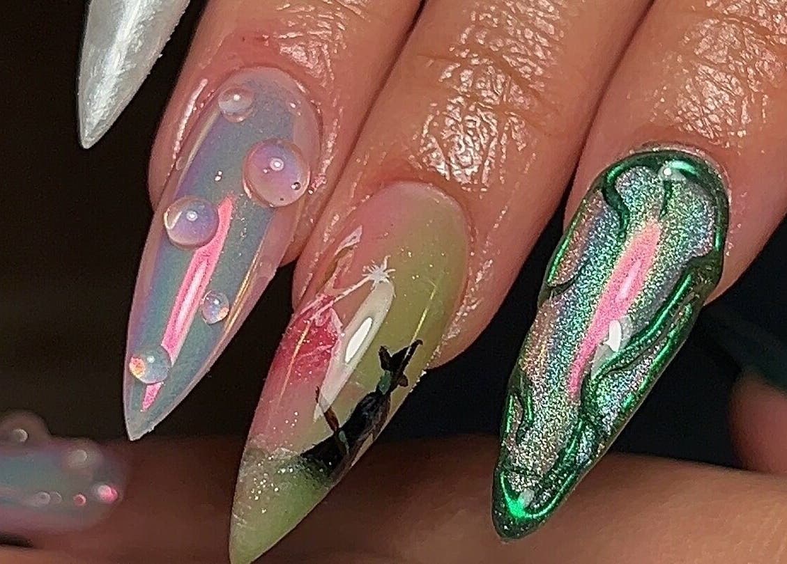 Close-up of artistic nail designs at Pressed Beans in Montréal, Québec, CA with vibrant colors and intricate detail.