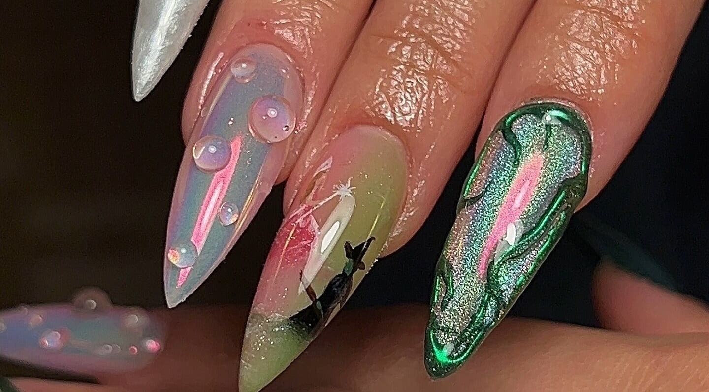 Close-up of artistic nail designs at Pressed Beans in Montréal, Québec, CA with vibrant colors and intricate detail.