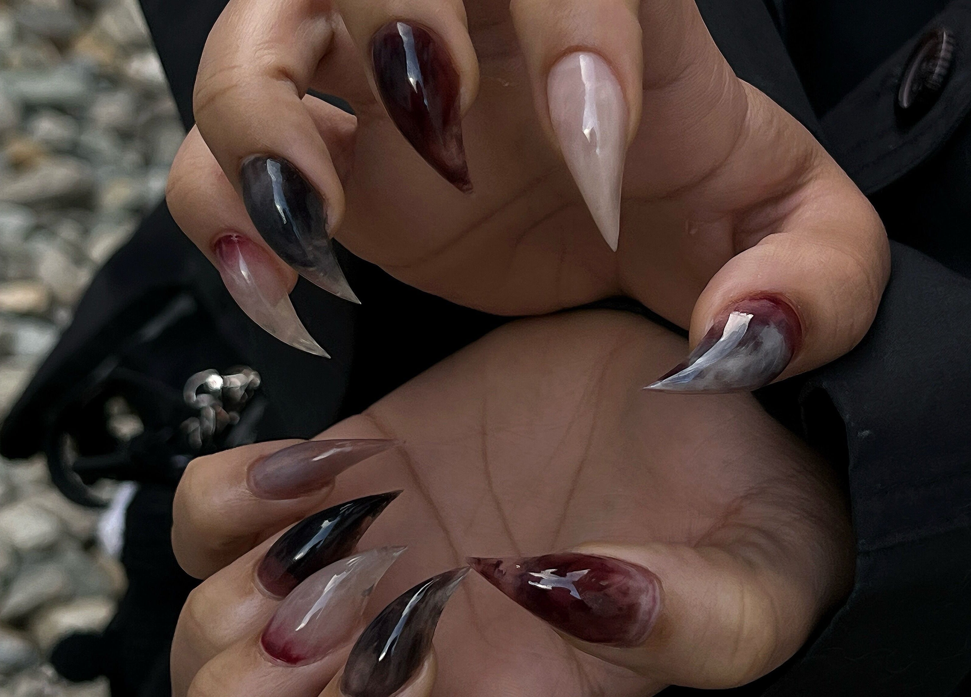 Elegant stiletto nails in dark hues at Pressed Beans, Montréal, Québec, CA.