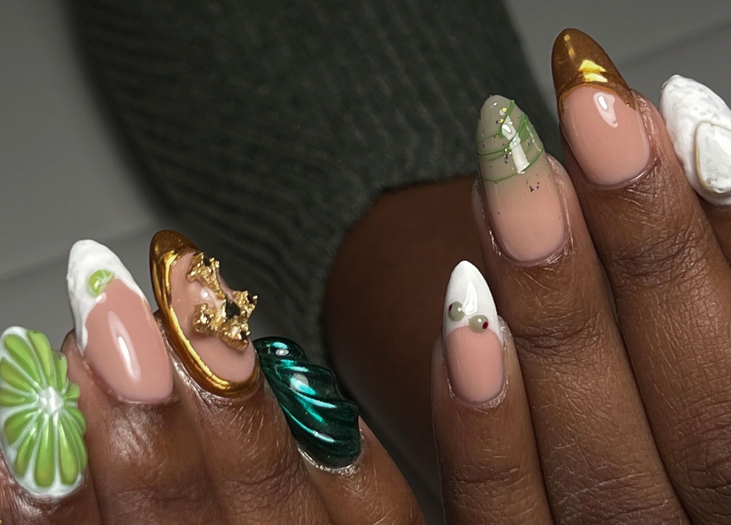 Intricate nail art at Pressed Beans, Montréal, Québec, CA showcasing unique designs and vibrant colors.