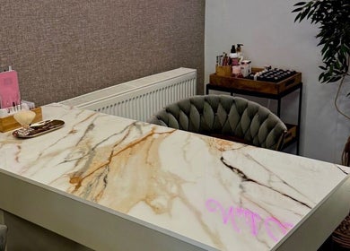 Luxurious marble nail station at Gracie’s Nail Lab, West Bromwich, England, GB, featuring modern decor.