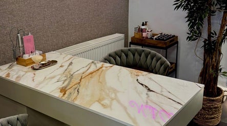 Luxurious marble nail station at Gracie’s Nail Lab, West Bromwich, England, GB, featuring modern decor.