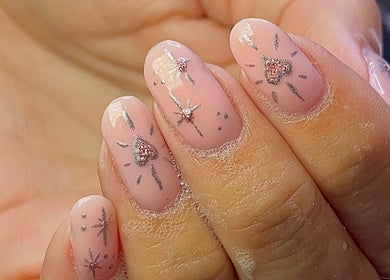 Elegant pink nails with sparkles at Gracie’s Nail Lab, West Bromwich, England, GB.