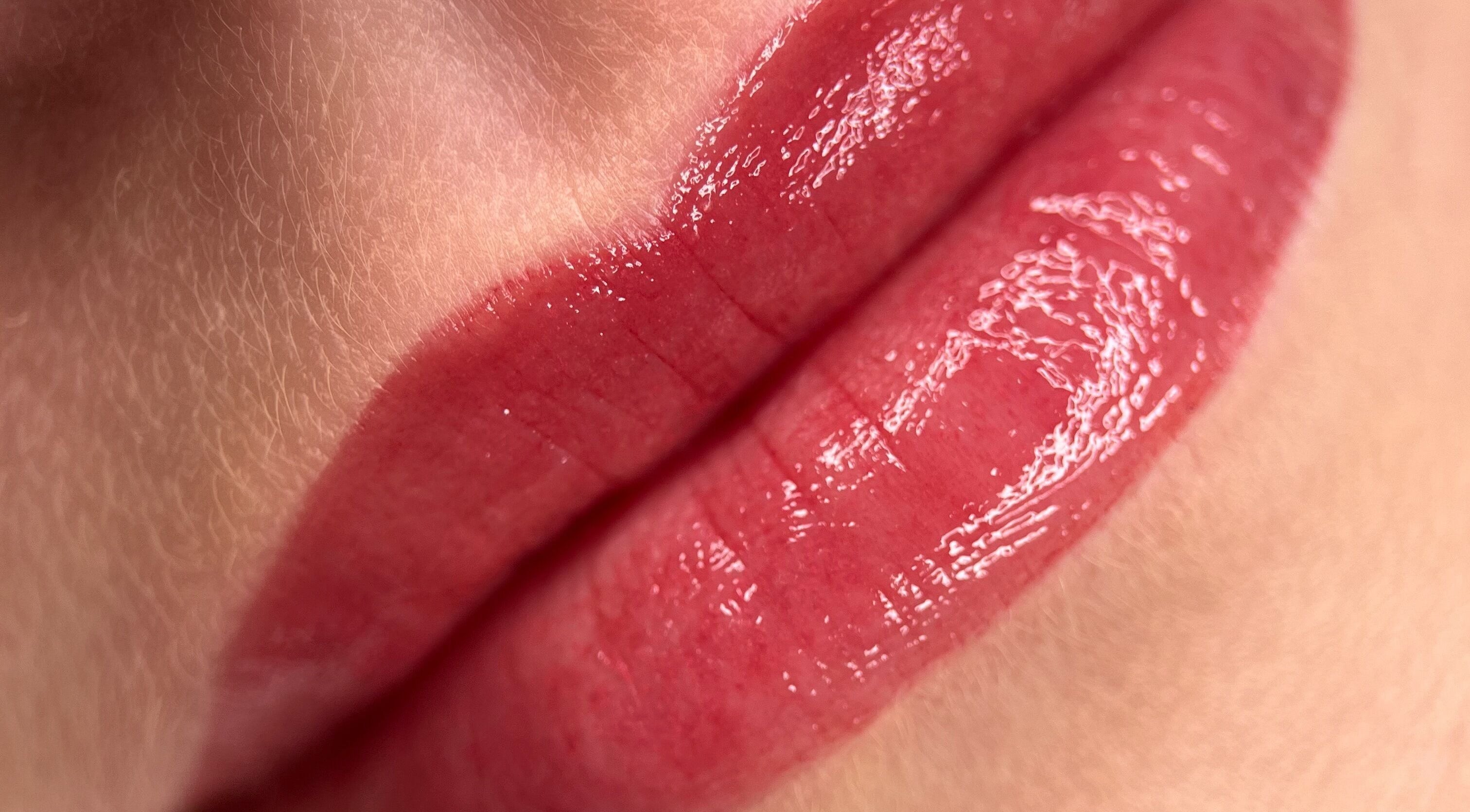 Elegant glossy lips showcasing professional makeup at Alina Gajewska Beauty, Abergavenny, Wales, GB.