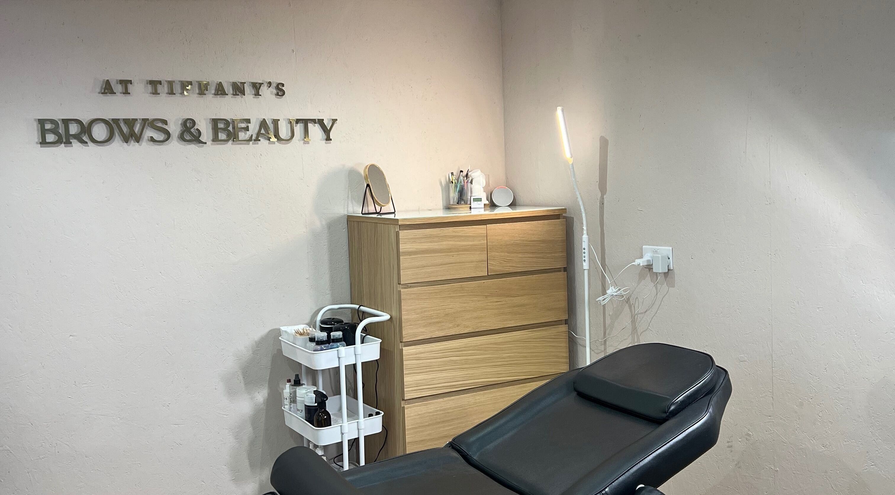 Relaxing treatment room at Tiffany’s Brows and Beauty, Northam, England, GB. Modern decor with a treatment chair.