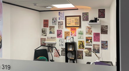 Artistic wall decor in Pineapple Chuncks Nail, Manchester, England, GB showcasing a creative atmosphere.