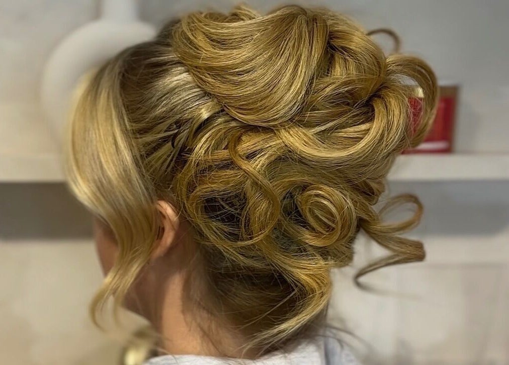 Elegant hairstyle updo at Corby, Home Salon in Weldon, England, GB.