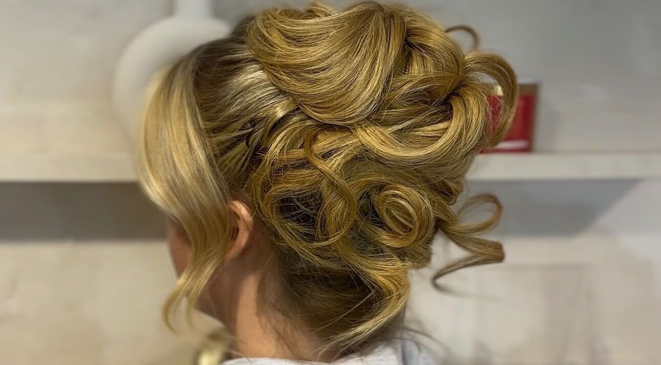 Elegant hairstyle updo at Corby, Home Salon in Weldon, England, GB.