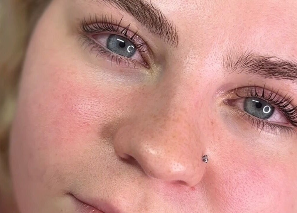 Close-up of radiant eyes and well-groomed eyebrows at Corby, Home Salon, Weldon, England, GB.