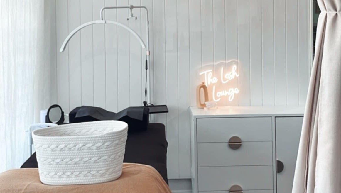 Cozy treatment area at The Lash Lounge by Lizzy, Engadine, New South Wales, AU, featuring modern decor.