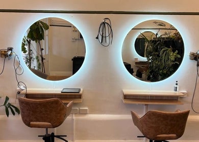 Chic salon chairs and mirrors at Olive For Hair, Mount Barker, Western Australia, AU highlighting modern style.