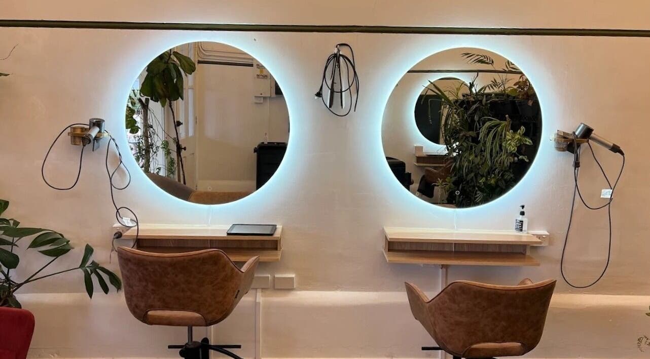 Chic salon chairs and mirrors at Olive For Hair, Mount Barker, Western Australia, AU highlighting modern style.