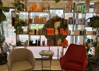 Shelves with beauty products at Olive For Hair, Mount Barker, Western Australia, AU, create a calming atmosphere.