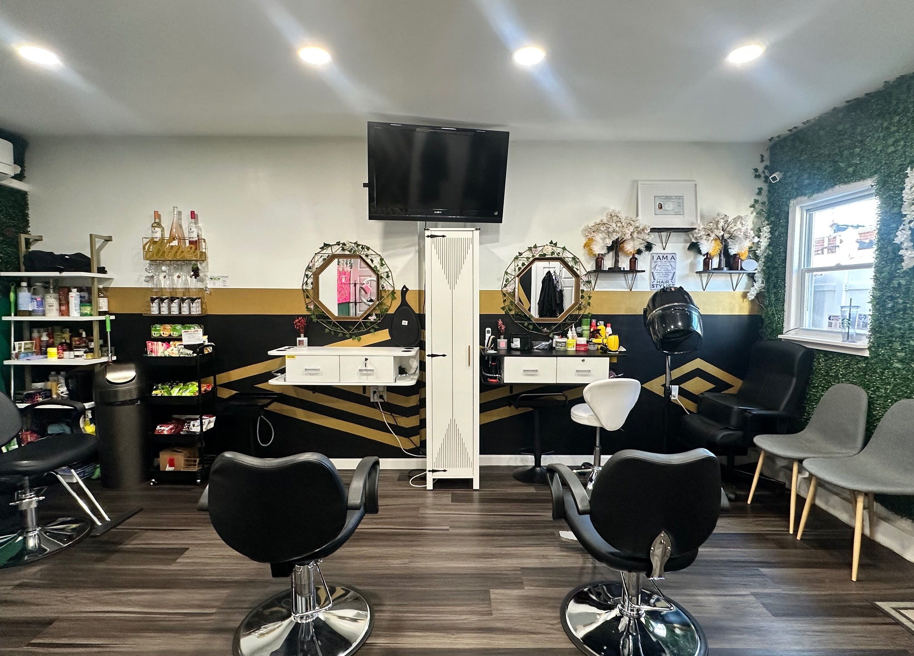 Modern interior of Laid Gracefully LLC salon in New York, New York, US with stylish chairs and decor.