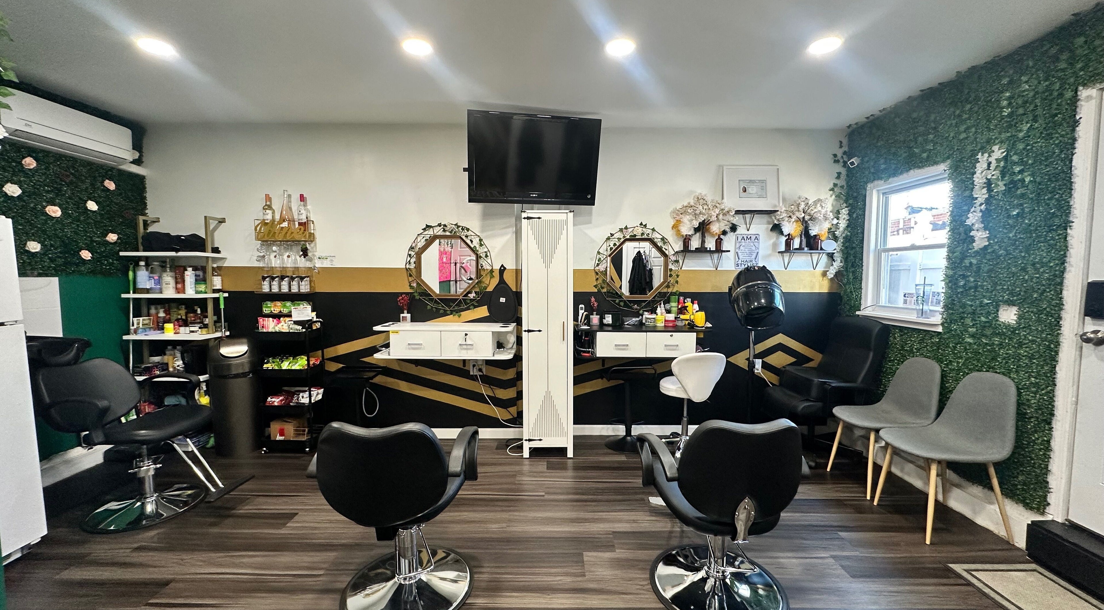 Modern interior of Laid Gracefully LLC salon in New York, New York, US with stylish chairs and decor.