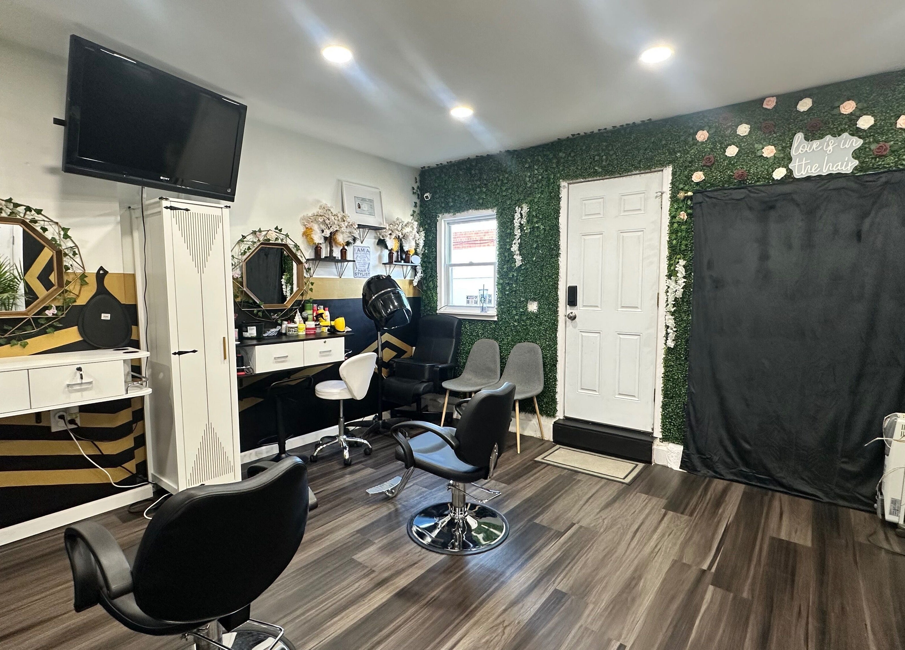 Chic interior of Laid Gracefully LLC, New York, showcasing stylish salon chairs and decor.