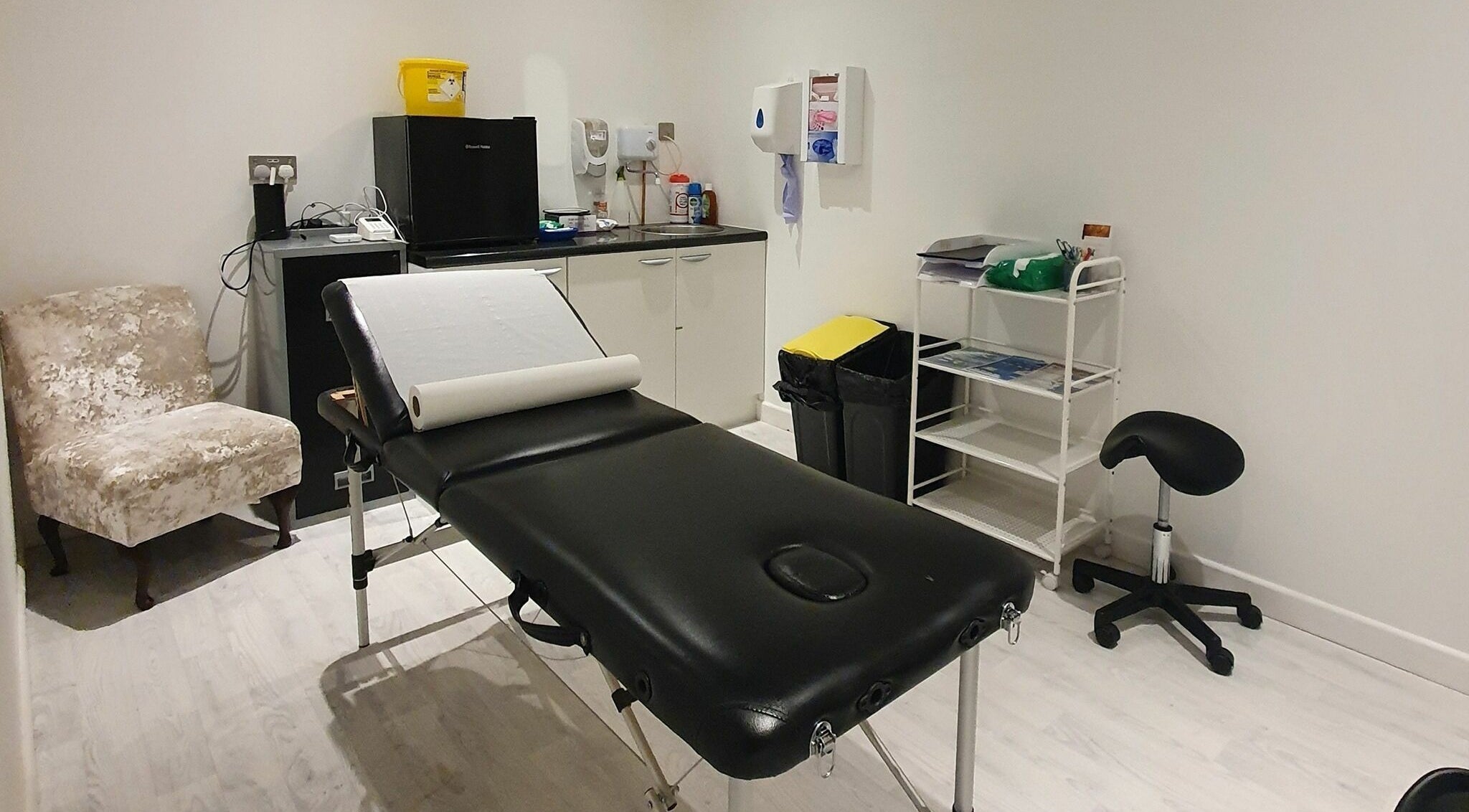 Calming treatment room at Enhance Your Glow, Penryn, England, GB for ultimate relaxation.