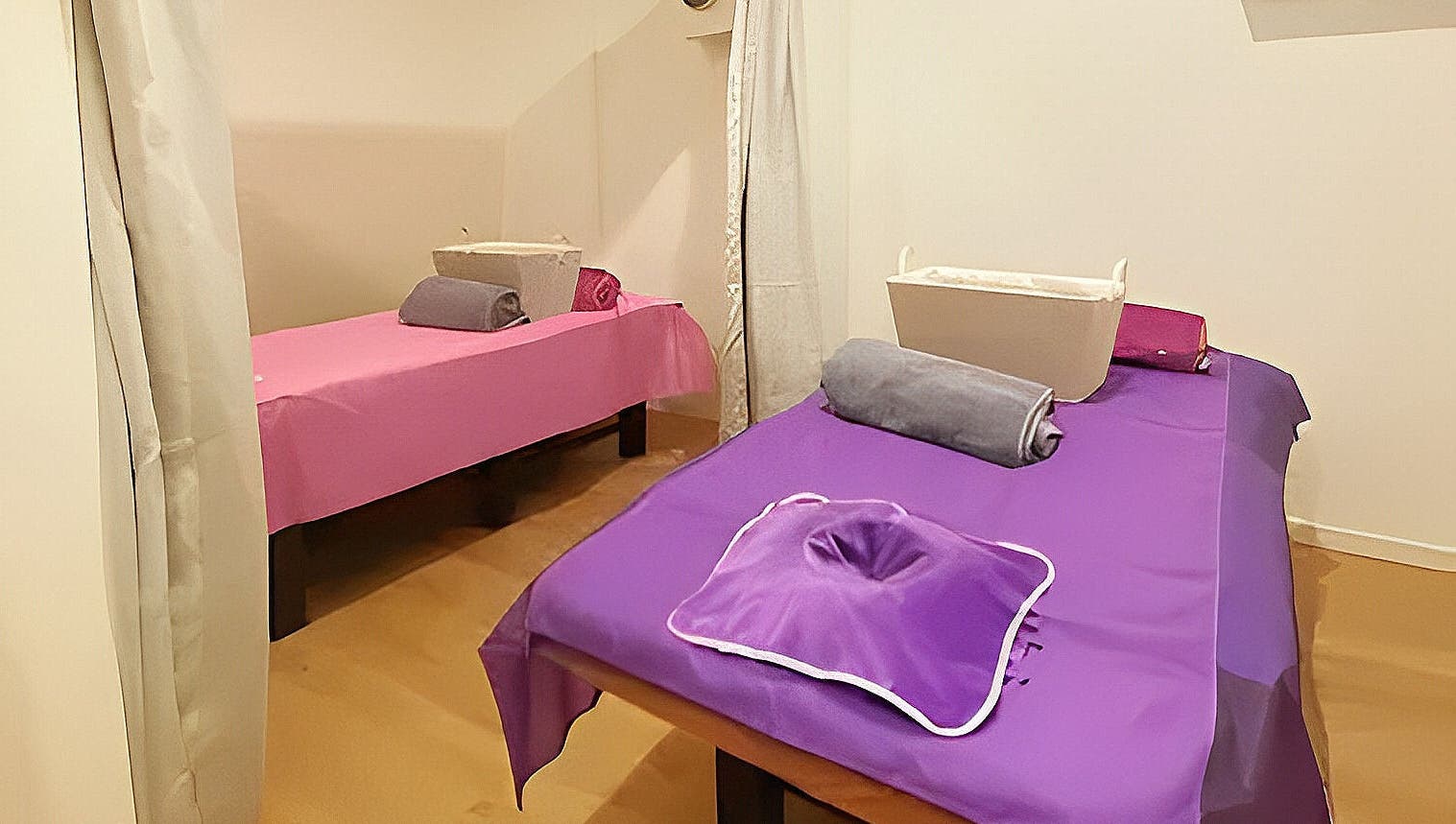 Tranquil massage room with two tables at Healing Hands Massage & Acupuncture in Brassall, Queensland, AU.