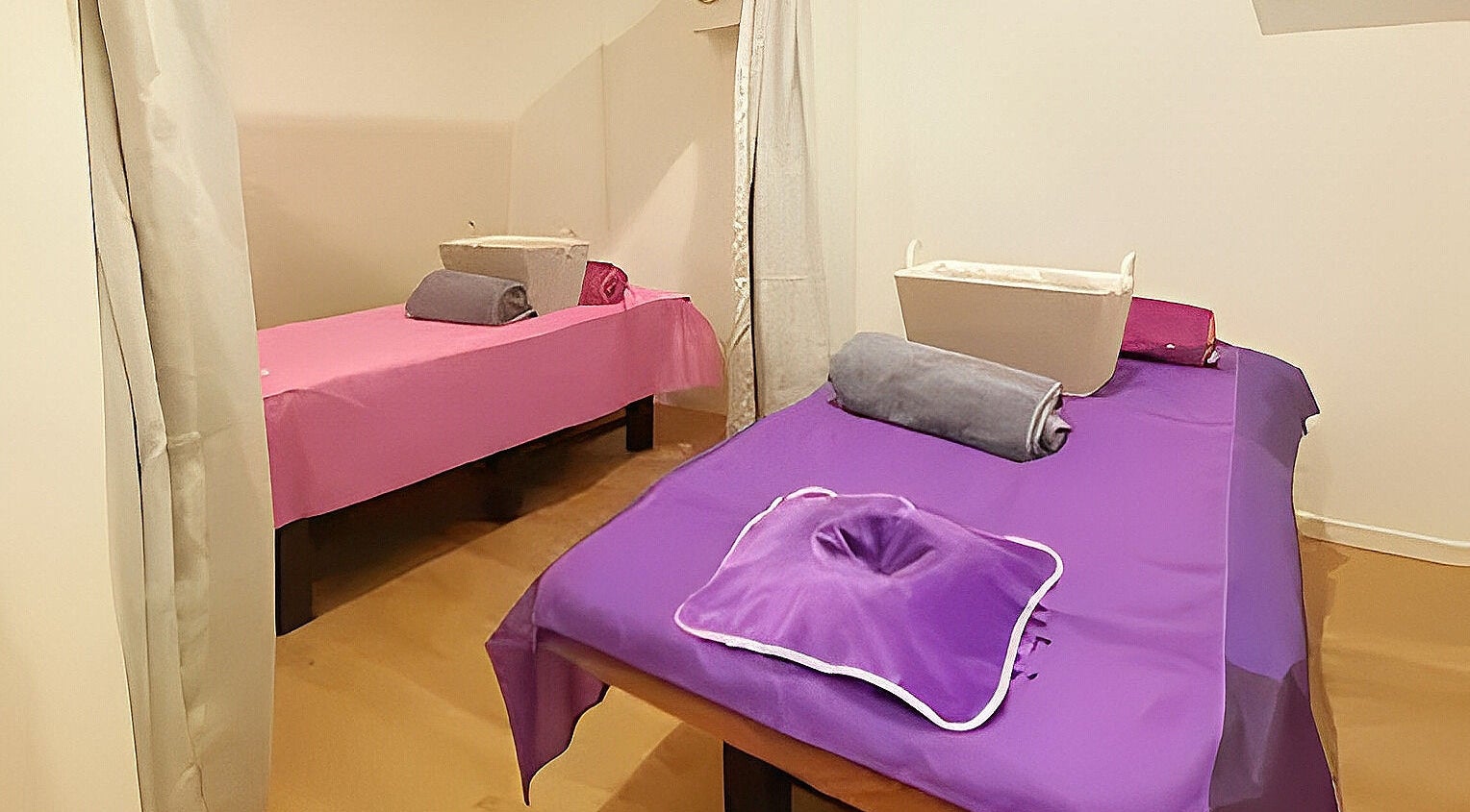 Tranquil massage room with two tables at Healing Hands Massage & Acupuncture in Brassall, Queensland, AU.