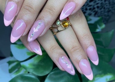 Pink nail art with rhinestones at Maria's Studio, Gqeberha, Eastern Cape, ZA.