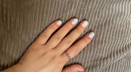 Pastel nail art with blue details at Ruth Elizabeth Beauty, Hinckley, England, GB.