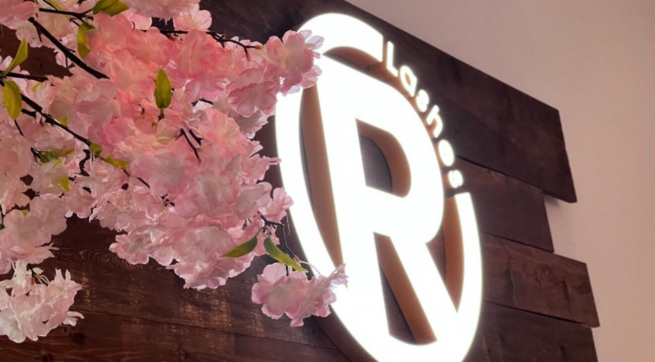 Bright Eléve Style Lash Brow Nail Bar/R-lashes sign with cherry blossoms in Covina, California, US.