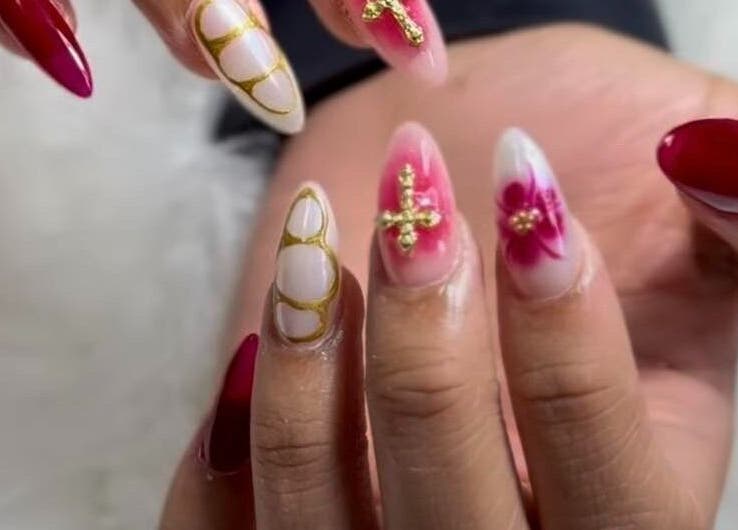 Stylish nail art with gold accents at Eléve Style Lash Brow Nail Bar/R-lashes in Covina, California, US.
