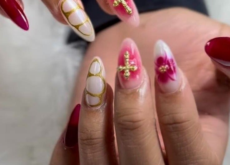 Stylish nail art with gold accents at Eléve Style Lash Brow Nail Bar/R-lashes in Covina, California, US.